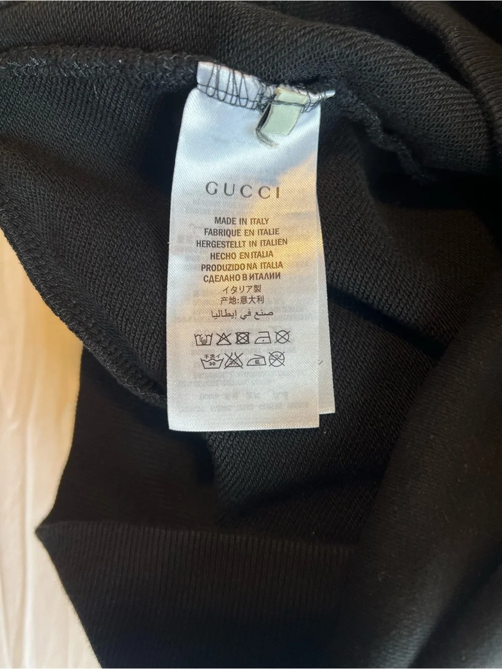 Gucci Mens Black Logo Graphic Sweater with Yellow Emblem